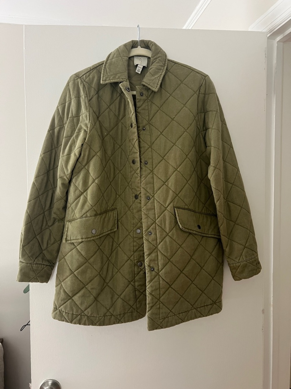 Green quilted jacket